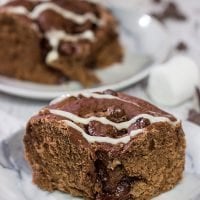 Inspired by two favorite winter recipes, these Hot Cocoa Cinnamon Rolls feature chocolaty rolls drizzled with a marshmallow glaze. They're perfect for cold winter days!
