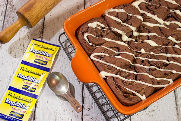 Inspired by two favorite winter recipes, these Hot Cocoa Cinnamon Rolls feature chocolaty rolls drizzled with a marshmallow glaze.  They're perfect for cold winter days!