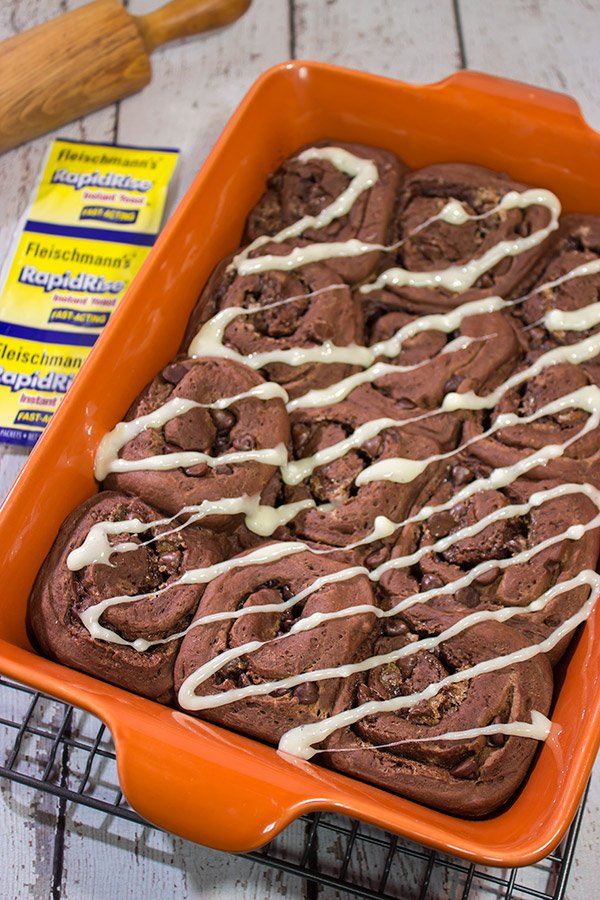 Inspired by two favorite winter recipes, these Hot Cocoa Cinnamon Rolls feature chocolaty rolls drizzled with a marshmallow glaze.  They're perfect for cold winter days!