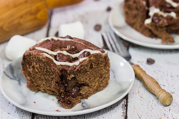 Inspired by two favorite winter recipes, these Hot Cocoa Cinnamon Rolls feature chocolaty rolls drizzled with a marshmallow glaze.  They're perfect for cold winter days!