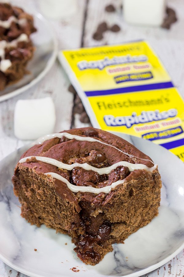 Inspired by two favorite winter recipes, these Hot Cocoa Cinnamon Rolls feature chocolaty rolls drizzled with a marshmallow glaze.  They're perfect for cold winter days!