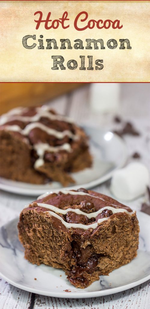 Inspired by two favorite winter recipes, these Hot Cocoa Cinnamon Rolls feature chocolaty rolls drizzled with a marshmallow glaze. They're perfect for cold winter days!