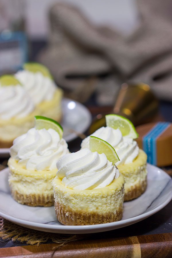 Lookin' for a fun dessert for warm evenings on the back porch? These Mini Margarita Cheesecakes are delicious! Cheers!