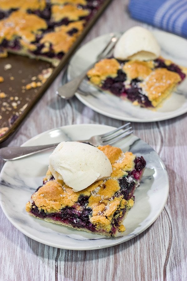 Looking to feed a crowd for a summer picnic? This Blueberry Slab Pie with Sugar Cookie Crust is a tasty answer!