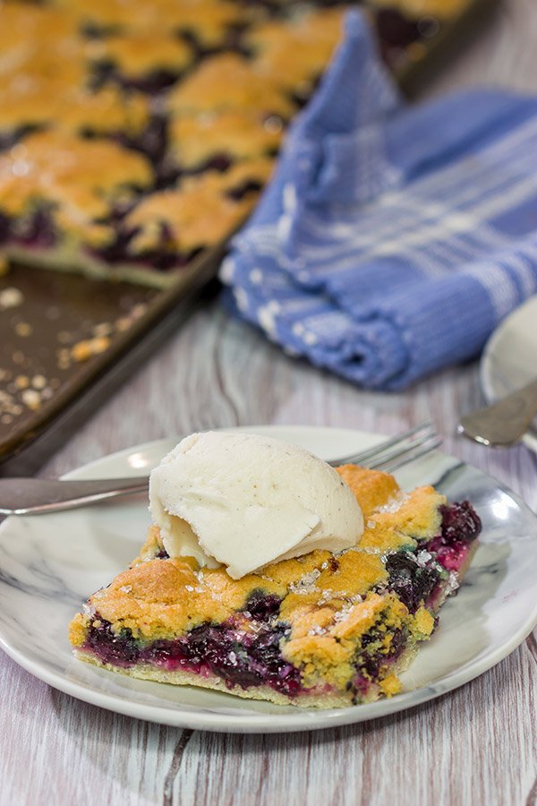 Looking to feed a crowd for a summer picnic? This Blueberry Slab Pie with Sugar Cookie Crust is a tasty answer!