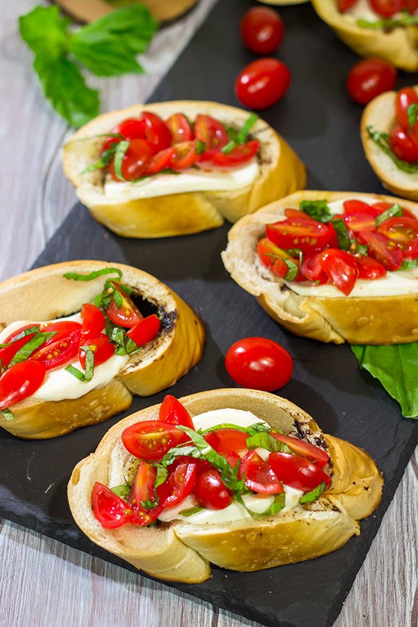 Fire up the grill!  These Grilled Caprese Crostini are a fun (and easy) summer appetizer!