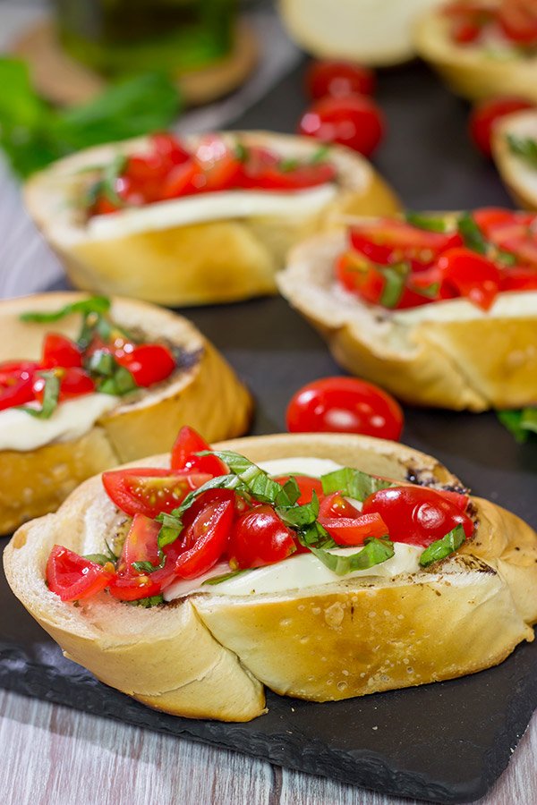 Fire up the grill!  These Grilled Caprese Crostini are a fun (and easy) summer appetizer!