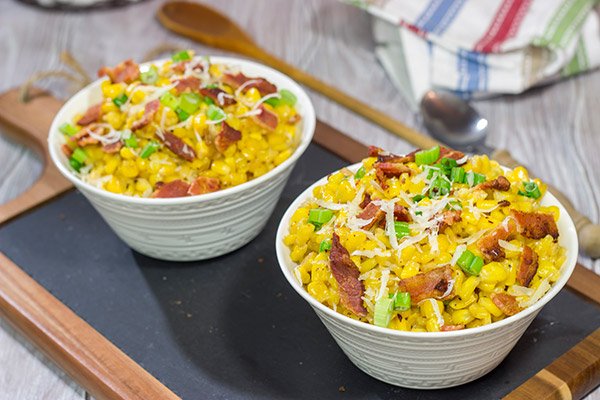 Fresh summer corn.  Crispy bacon.  Parmesan cheese.  This Creamed Corn with Bacon is a delicious side dish for summer grilling!