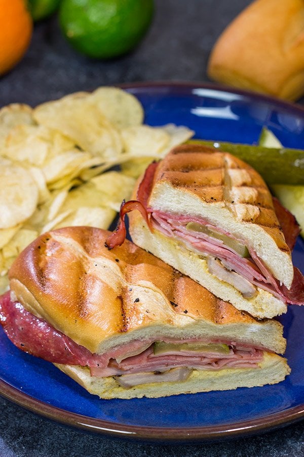 Packed with 3 types of meat, cheese and pickles, these Grilled Cuban Sandwiches are a delicious way to mix up dinner on the grill!