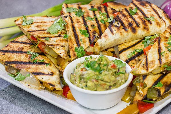 Packed with summer flavor, these Grilled Veggie Quesadillas are a tasty way to enjoy dinner on the grill!