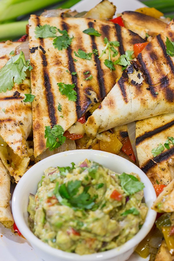 Packed with summer flavor, these Grilled Veggie Quesadillas are a tasty way to enjoy dinner on the grill!