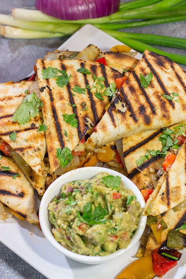 Packed with summer flavor, these Grilled Veggie Quesadillas are a tasty way to enjoy dinner on the grill!