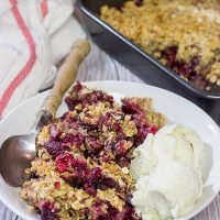 Topped with brown sugar and oats, this Sour Cherry Crumble is a tasty way to enjoy summer fruit! Just don't forget the ice cream!