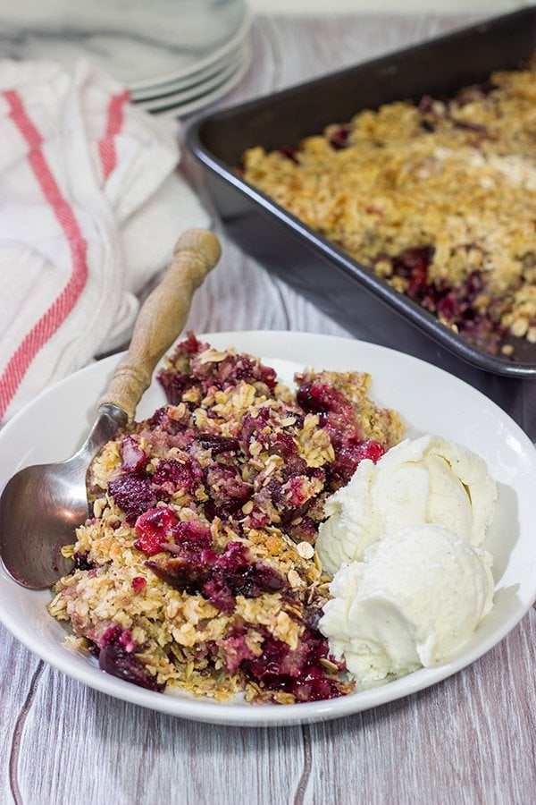 Topped with brown sugar and oats, this Sour Cherry Crumble is a tasty way to enjoy summer fruit!  Just don't forget the ice cream!