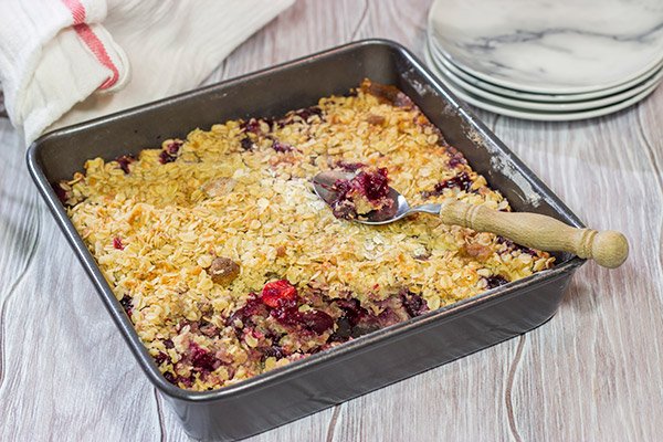 Topped with brown sugar and oats, this Sour Cherry Crumble is a tasty way to enjoy summer fruit! Just don't forget the ice cream!