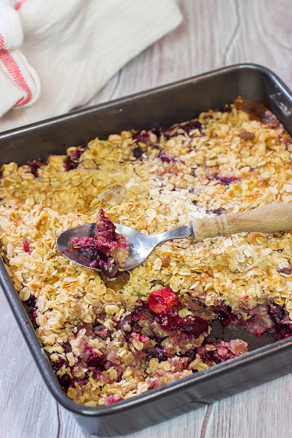 Topped with brown sugar and oats, this Sour Cherry Crumble is a tasty way to enjoy summer fruit! Just don't forget the ice cream!