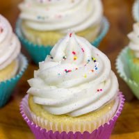 These Vanilla Cupcakes with Vanilla Bean Frosting are a classic! The cupcakes are soft and fluffy, and the frosting is insanely delicious. Bake up a batch today!