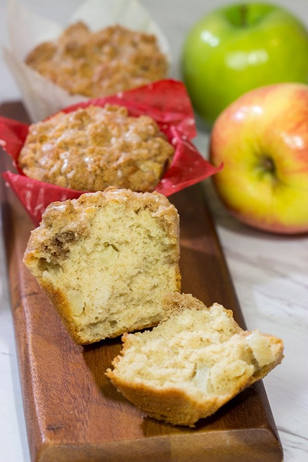 These Cinnamon Apple Muffins are loaded with apples and cinnamon...and topped with a delicious crunchy cinnamon streusel! They're perfect for chilly Autumn mornings!