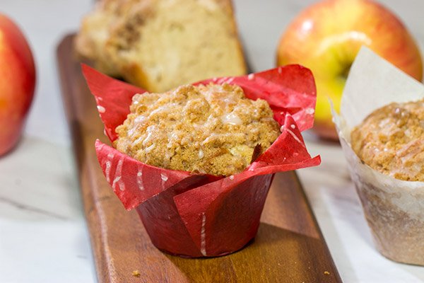 These Cinnamon Apple Muffins are loaded with apples and cinnamon...and topped with a delicious crunchy cinnamon streusel!  They're perfect for chilly Autumn mornings!