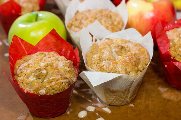 These Cinnamon Apple Muffins are loaded with apples and cinnamon...and topped with a delicious crunchy cinnamon streusel!  They're perfect for chilly Autumn mornings!