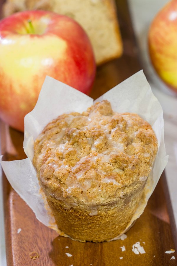 These Cinnamon Apple Muffins are loaded with apples and cinnamon...and topped with a delicious crunchy cinnamon streusel!  They're perfect for chilly Autumn mornings!