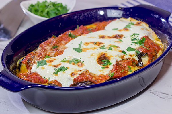 Eggplant Involtini is a classic Italian recipe.  This version features a lemon herb ricotta filling rolled up inside of slices of roasted eggplant.  It's delicious!
