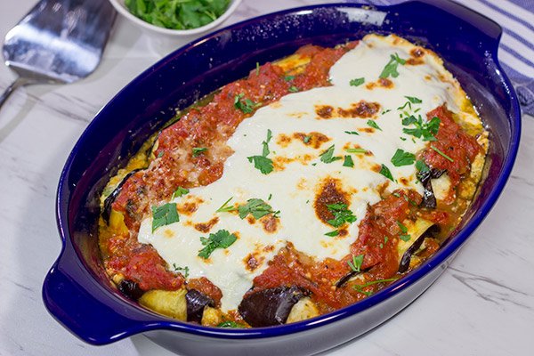 Eggplant Involtini is a classic Italian recipe.  This version features a lemon herb ricotta filling rolled up inside of slices of roasted eggplant.  It's delicious!