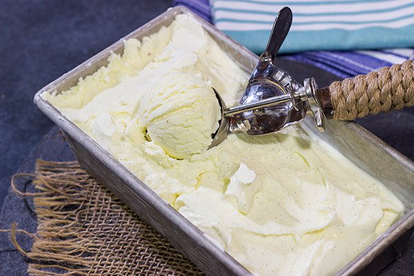 This homemade French Vanilla Ice Cream is packed with vanilla beans for a deep vanilla flavor.  Grab a scoop for dessert tonight!
