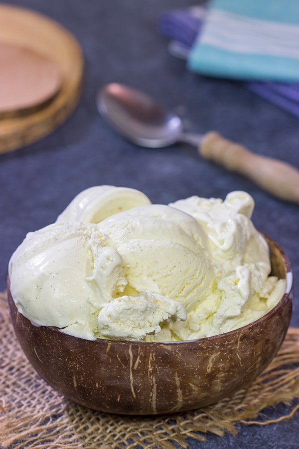 This homemade French Vanilla Ice Cream is packed with vanilla beans for a deep vanilla flavor.  Grab a scoop for dessert tonight!