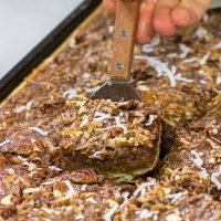 Studded with chopped pecans and shredded coconut, this German Chocolate Slab Pie is a tasty (and easy) way to feed a crowd!