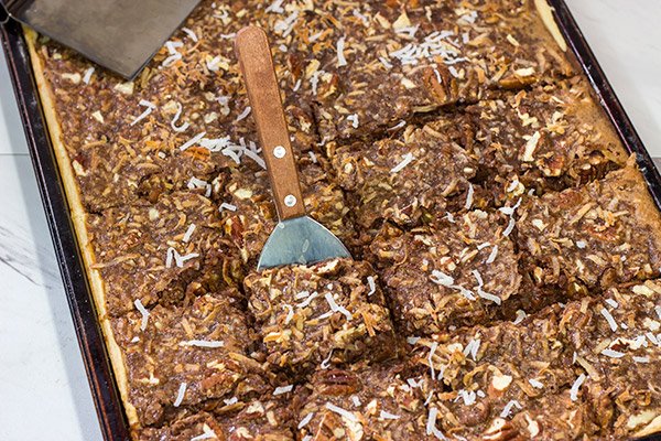 Studded with chopped pecans and shredded coconut, this German Chocolate Slab Pie is a tasty (and easy) way to feed a crowd!