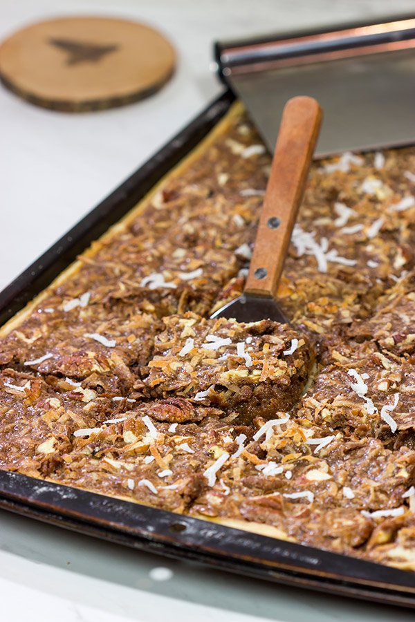 Studded with chopped pecans and shredded coconut, this German Chocolate Slab Pie is a tasty (and easy) way to feed a crowd!