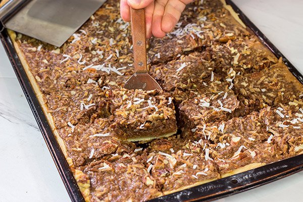 Studded with chopped pecans and shredded coconut, this German Chocolate Slab Pie is a tasty (and easy) way to feed a crowd!