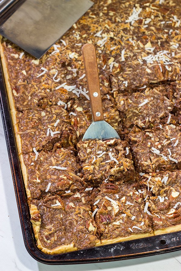 Studded with chopped pecans and shredded coconut, this German Chocolate Slab Pie is a tasty (and easy) way to feed a crowd!
