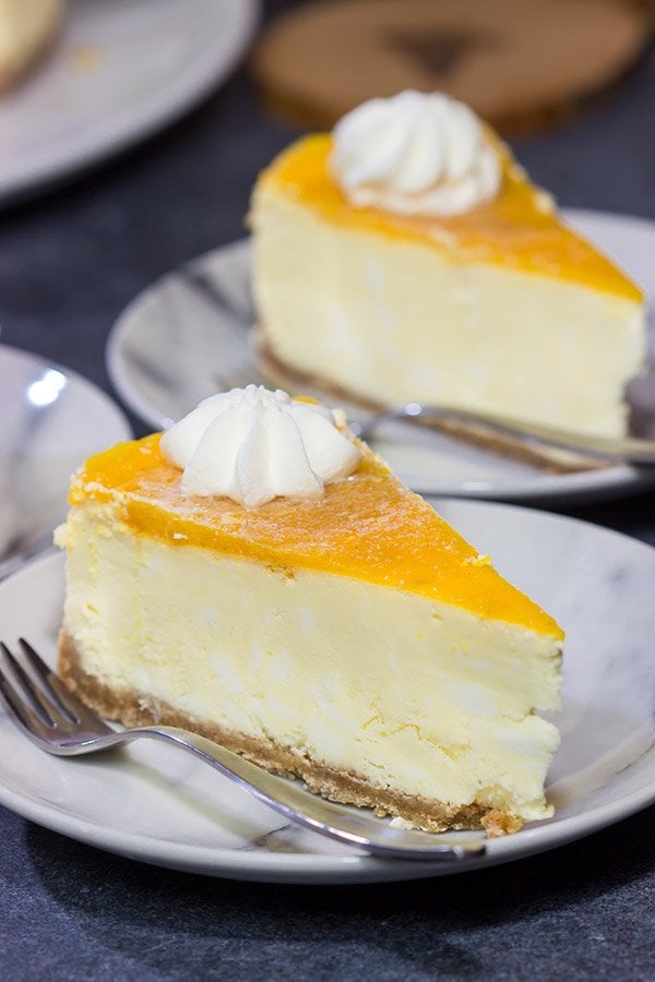 This Passion Fruit Cheesecake is packed with tropical flavors! It's the perfect dessert for a warm summer evening. Cheers!