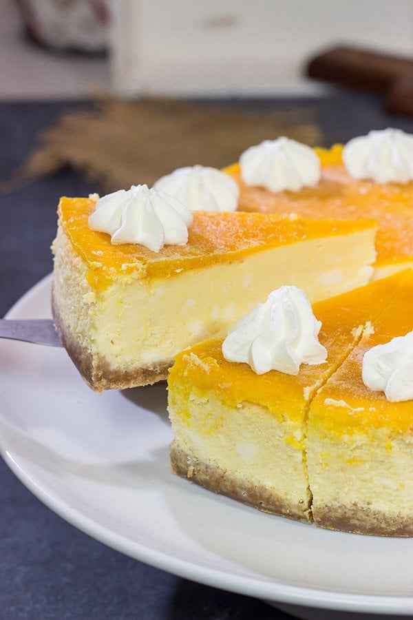 This Passion Fruit Cheesecake is packed with tropical flavors! It's the perfect dessert for a warm summer evening. Cheers!