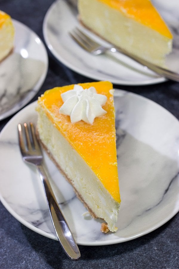 This Passion Fruit Cheesecake is packed with tropical flavors! It's the perfect dessert for a warm summer evening. Cheers!