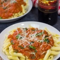 Penne alla Vodka features pasta with an easy, creamy pasta sauce (and, yes, the pasta sauce calls for a bit of vodka)!