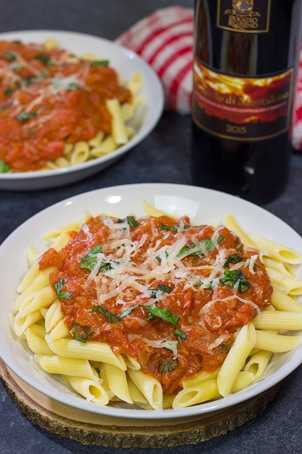 Penne alla Vodka features pasta with an easy, creamy pasta sauce (and, yes, the pasta sauce calls for a bit of vodka)!