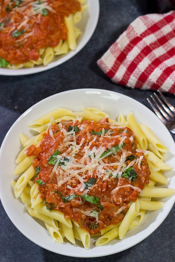 Penne alla Vodka features pasta with an easy, creamy pasta sauce (and, yes, the pasta sauce calls for a bit of vodka)!