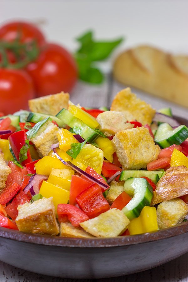 Packed with fresh veggies and perfectly toasted bread cubes, Panzanella is a classic side dish that's great for summer entertaining!