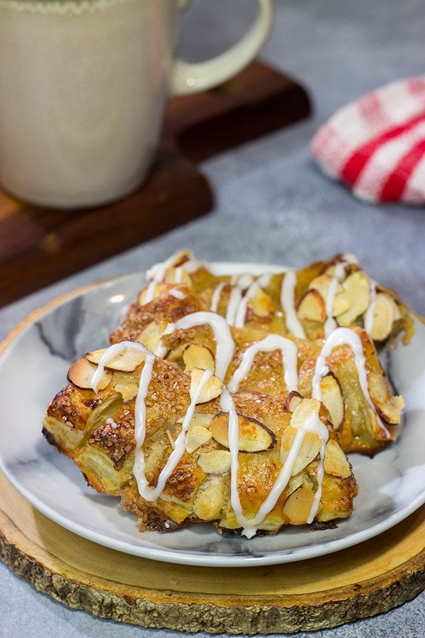 Filled with almond paste and topped with sliced almonds, these Almond Bear Claws are a fun and tasty breakfast treat!