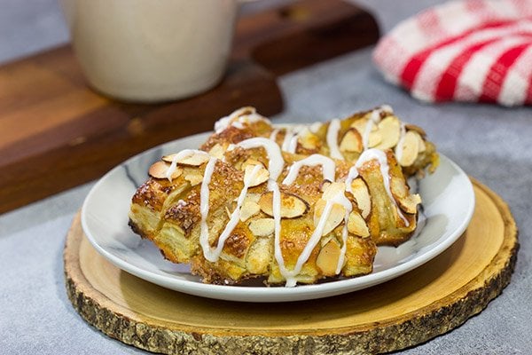 Filled with almond paste and topped with sliced almonds, these Almond Bear Claws are a fun and tasty breakfast treat!