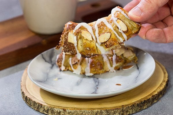 Filled with almond paste and topped with sliced almonds, these Almond Bear Claws are a fun and tasty breakfast treat!