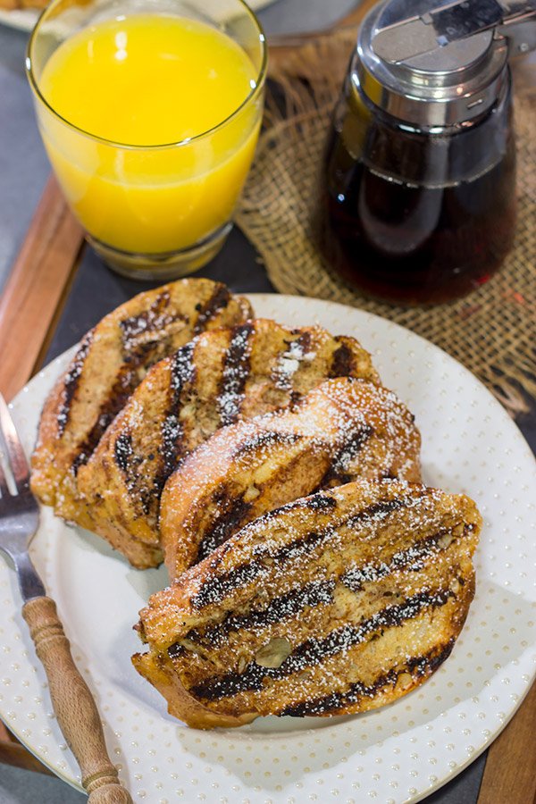 Fire up that grill and get your day off to a delicious start!  This Grilled French Toast is a fun (and tasty) way to enjoy breakfast on the grill.