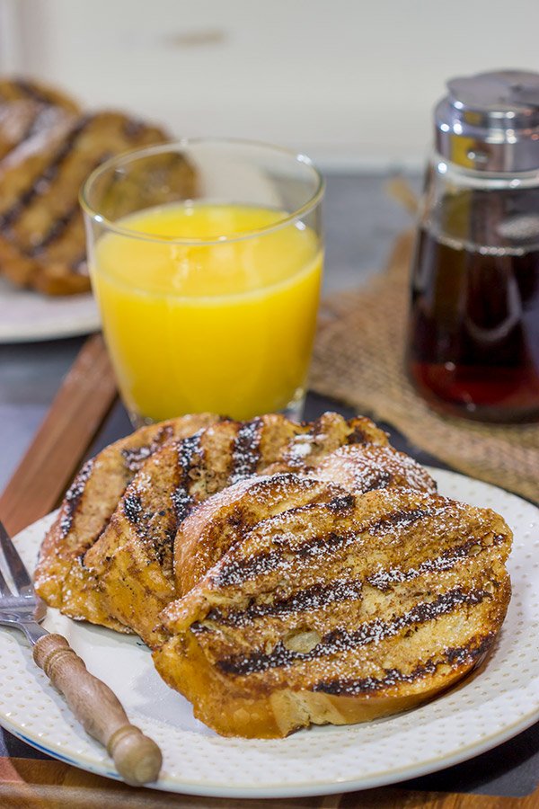 Fire up that grill and get your day off to a delicious start!  This Grilled French Toast is a fun (and tasty) way to enjoy breakfast on the grill.