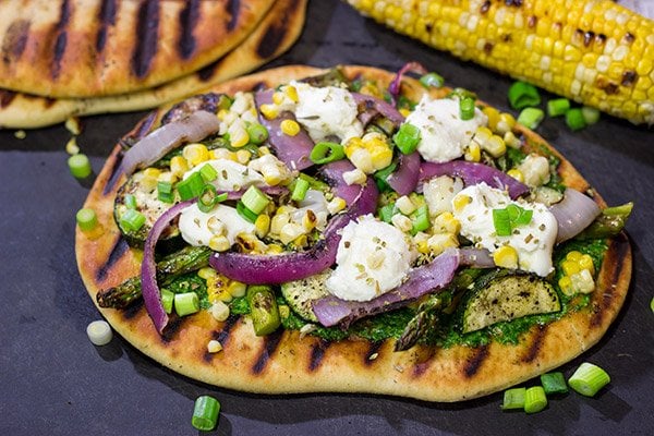 These Grilled Vegetable Flatbreads are a delicious (and easy) summer recipe.  Feel free to use whatever veggies are in the garden or on sale!