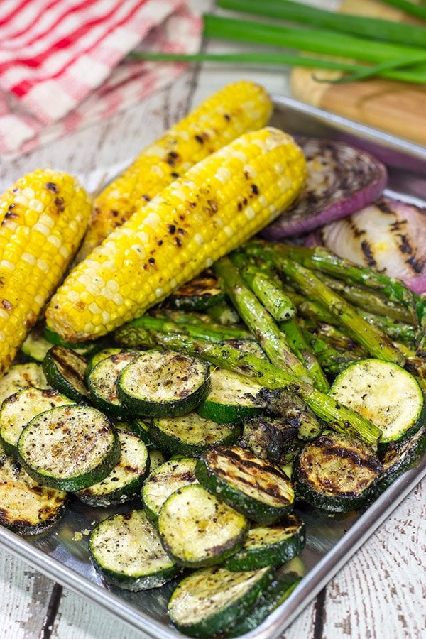 These Grilled Vegetable Flatbreads are a delicious (and easy) summer recipe.  Feel free to use whatever veggies are in the garden or on sale!