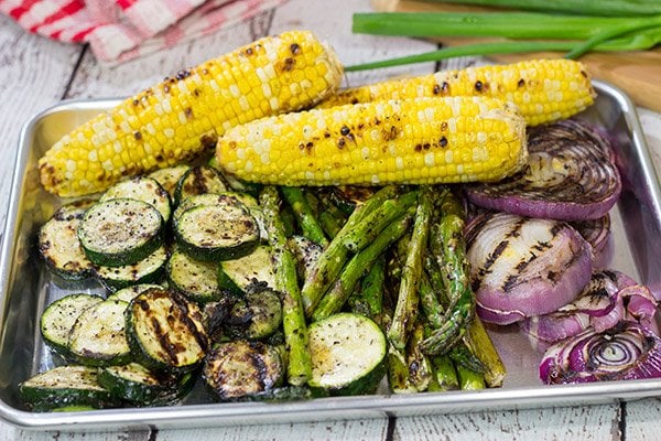 These Grilled Vegetable Flatbreads are a delicious (and easy) summer recipe.  Feel free to use whatever veggies are in the garden or on sale!