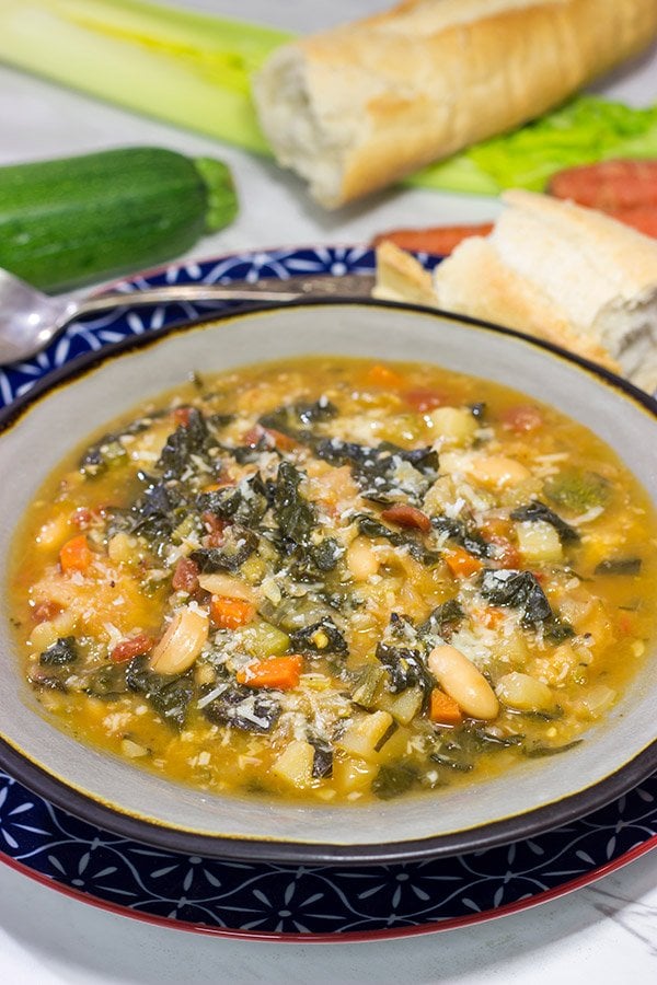 With chilly Winter days around the corner, grab some leftover bread and make a pot of Ribollita.  This Tuscan White Bean Stew is a delicious way to warm up on a cold day!